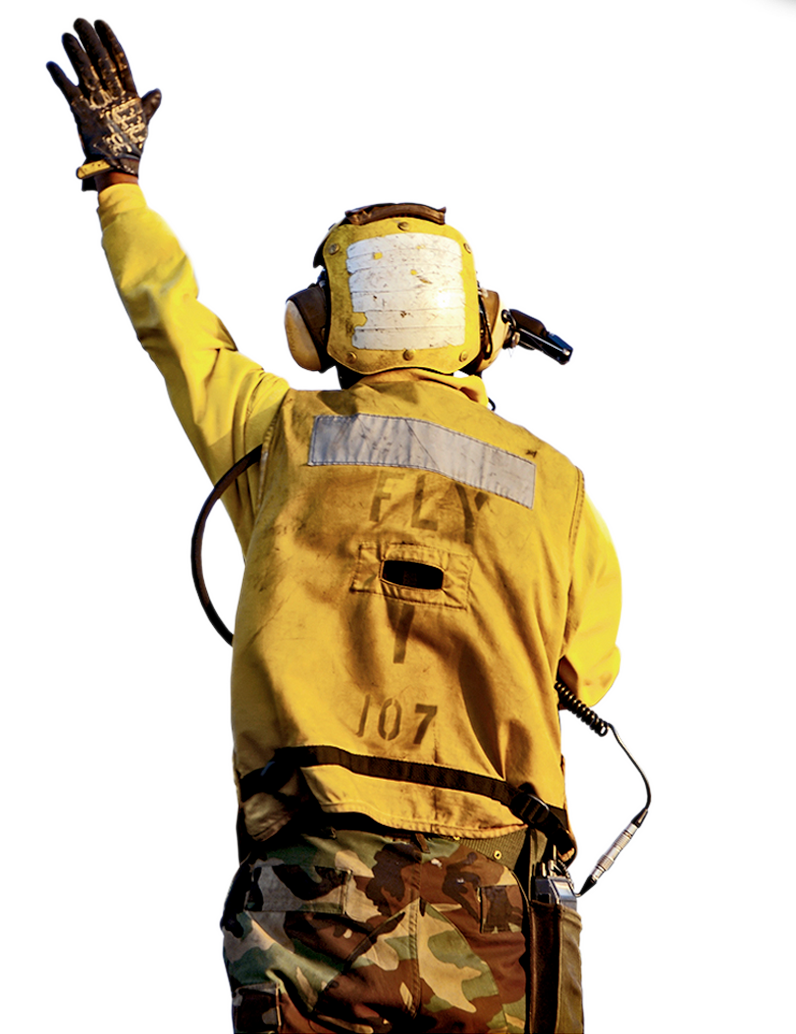 Air trafic controller in yellow safety suit